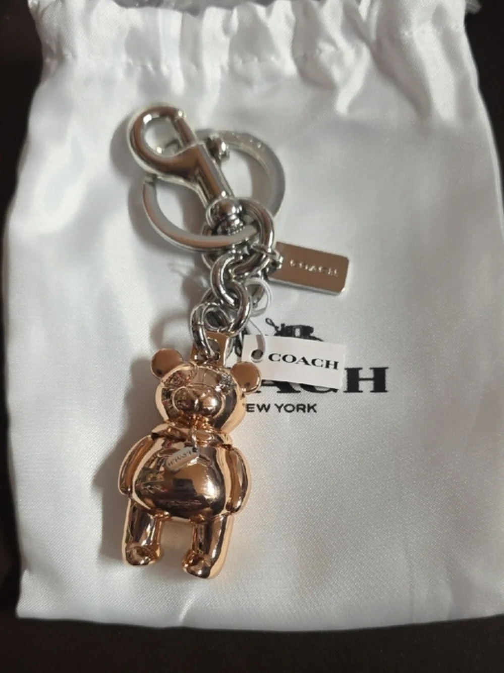 The official Rose Gold Coach 3D Mascot Bear Bag Charm & Keychain